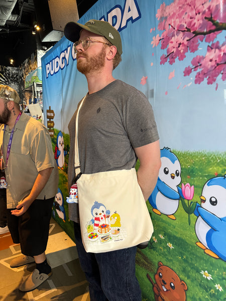 Pebbles Pengu cross-body canvas bag